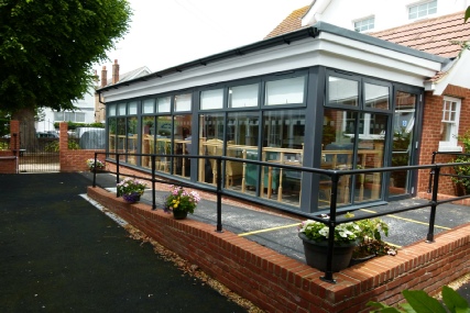 The rear entrance, Resident's patio and garden at Braintree Nursing Home